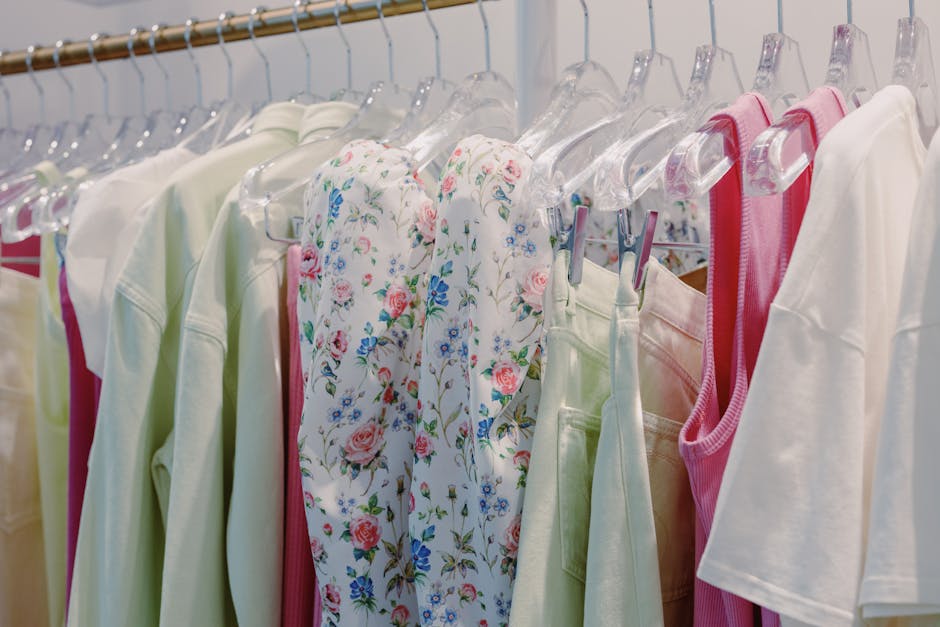 Vibrant selection of clothes on display in a modern boutique, showcasing fashion trends.